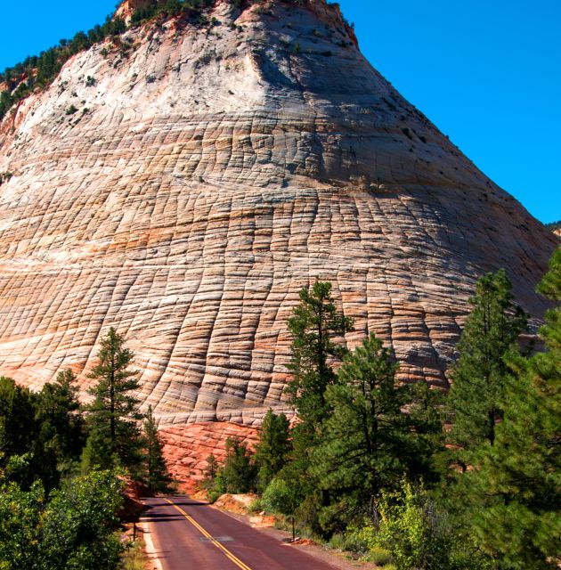 Bryce Canyon and Zion Park Combo Tour From Las Vegas - Bryce Canyon red rock stops: castles, caverns, and wildlife