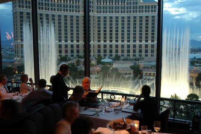 Helicopter Flight of the Las Vegas Strip with Eiffel Tower Dinner - Transportation details, dress code rules, and the 250-lb seat limit