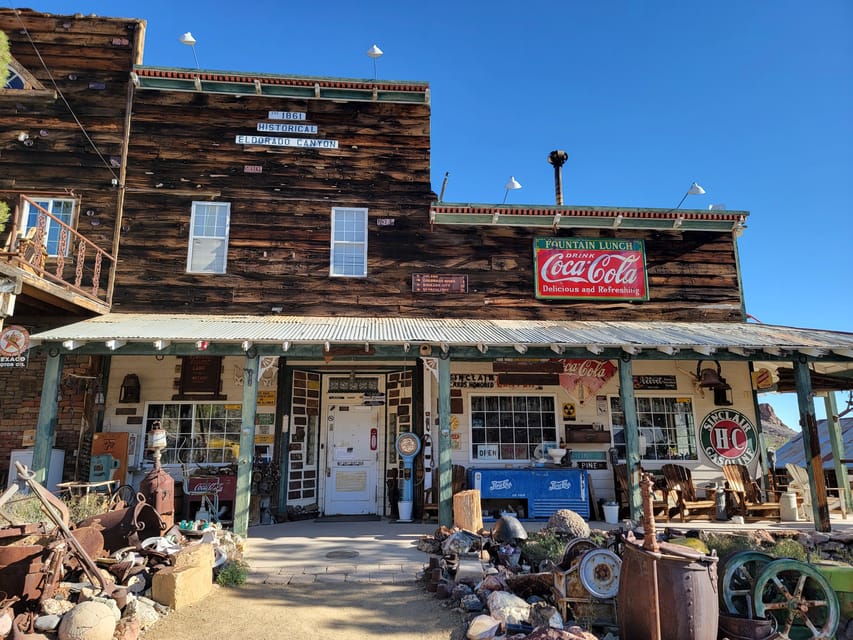 Las Vegas Eldorado Canyon & Nelson Ghost Town Adventure Tour - Nelson Ghost Town: antiques, vintage cars, and hands-on exploring time