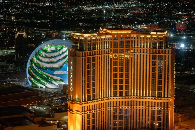 Las Vegas Strip Highlights by Helicopter at Night - The Stratosphere Loop: A Tower You Can’t Miss