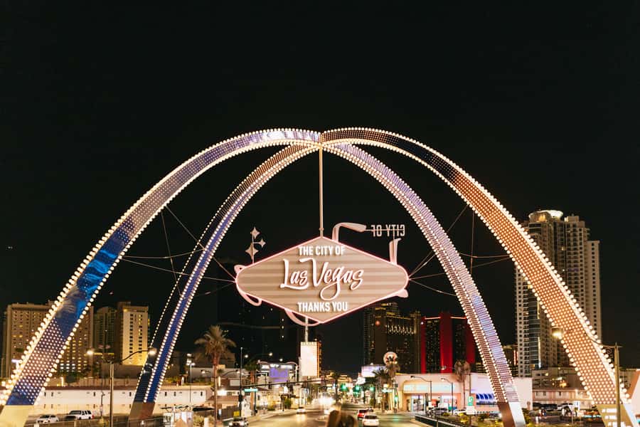 Las Vegas: Vegas After Dark Night Tour with Free Drink (21+) - Entering the night: Hard Rock Cafe, drink in hand, then bus time