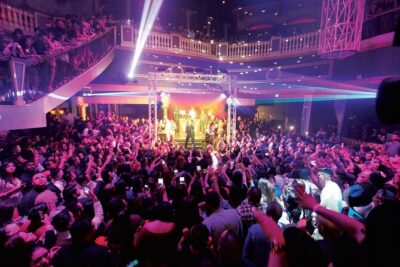 Latin Nightclub Tour by Party Bus w/ Fast-Pass Entry - The Strip Cruise and Welcome Sign Stop (plus free mixed drinks)