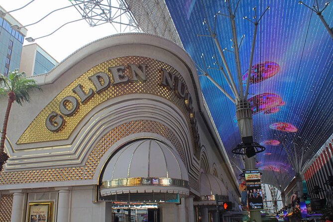 Original Las Vegas: The Fremont Street Experience Walking Tour - Under Viva Vision: Fremont Street Experience in daylight and at night