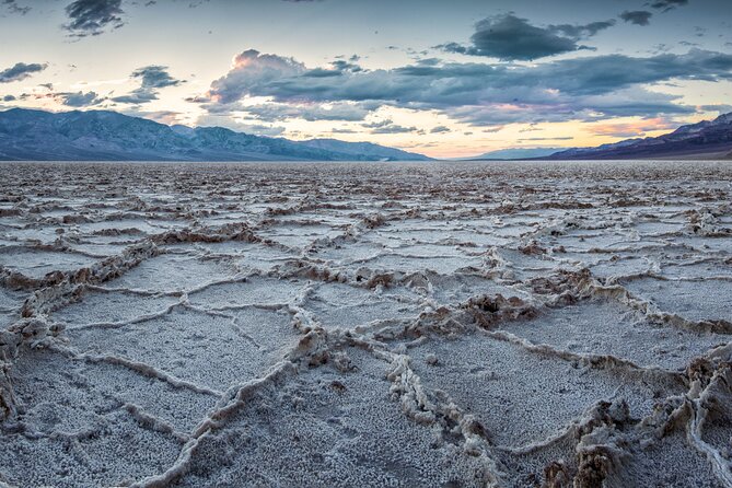 Small Group One Day Tour Death Valley National Park and Rhyolite Ghost Town - Zabriskie Point: badlands views and the salt flats in the distance